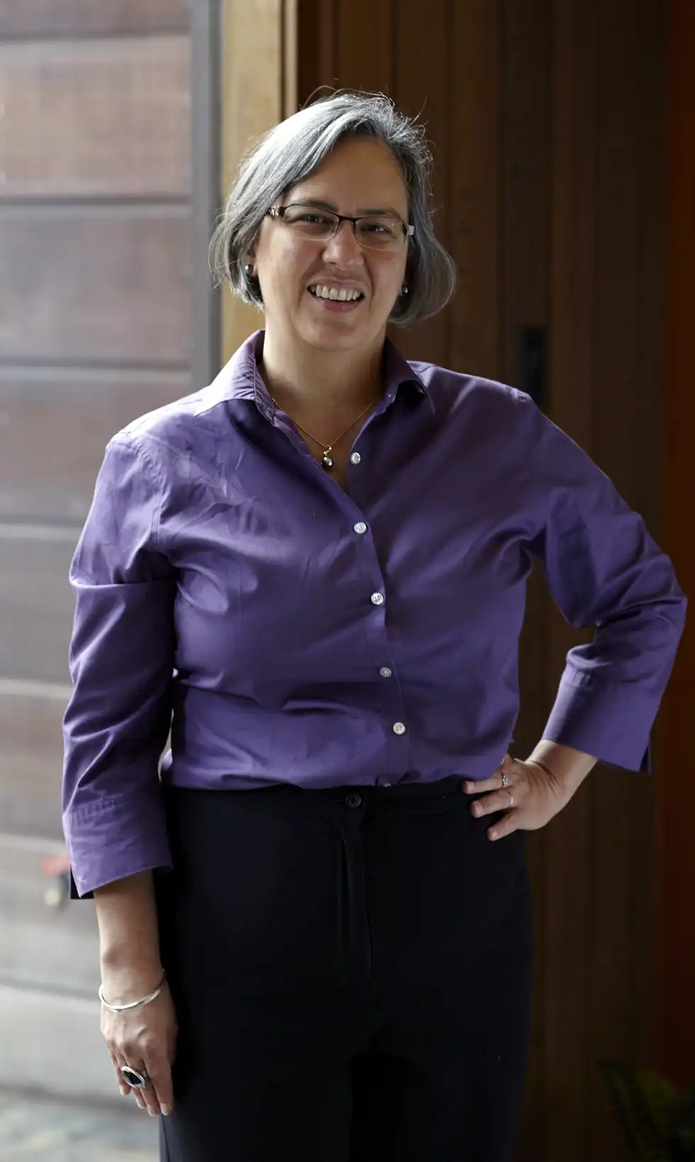 Portrait of Dr. Ann Blake wearing a lavender top